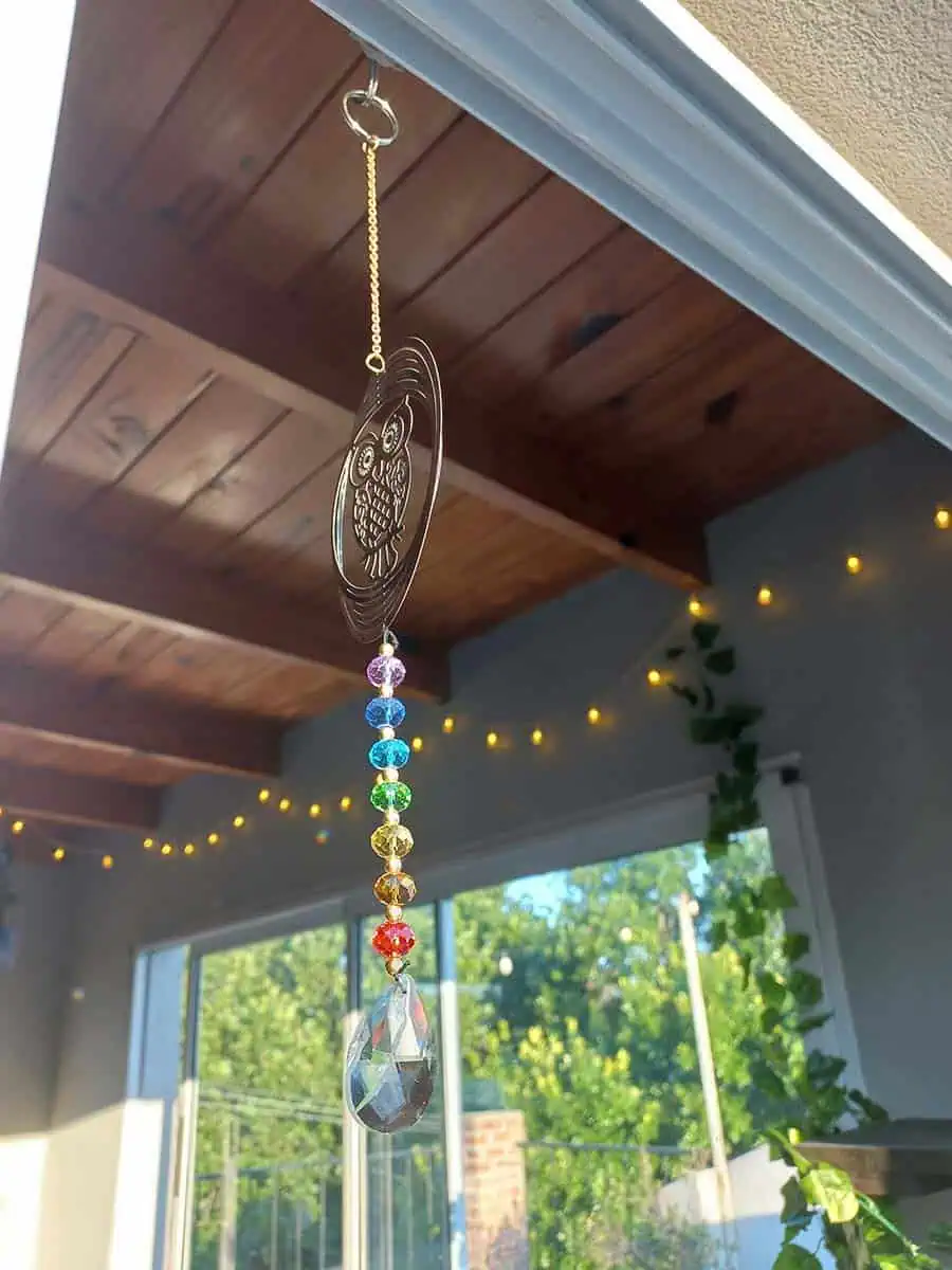 imagen de un atrapasol de acero inoxidable con lechuza