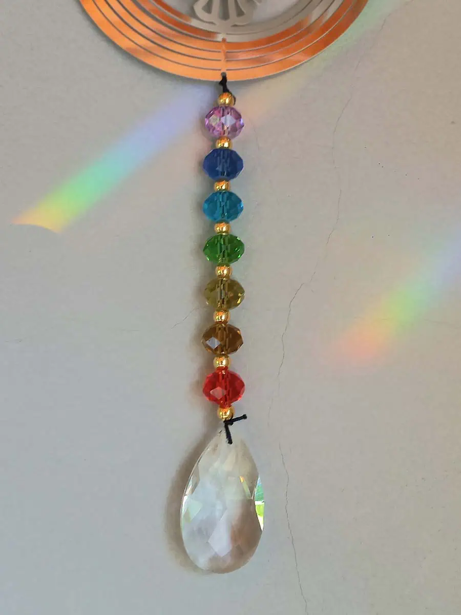 imagen de un atrapasol de acero inoxidable con lechuza