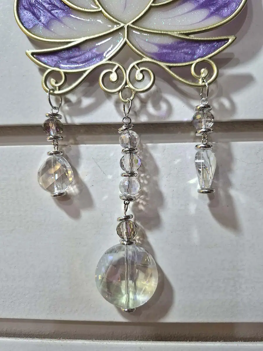 Atrapasol decorativo con flor de loto violeta para ventana