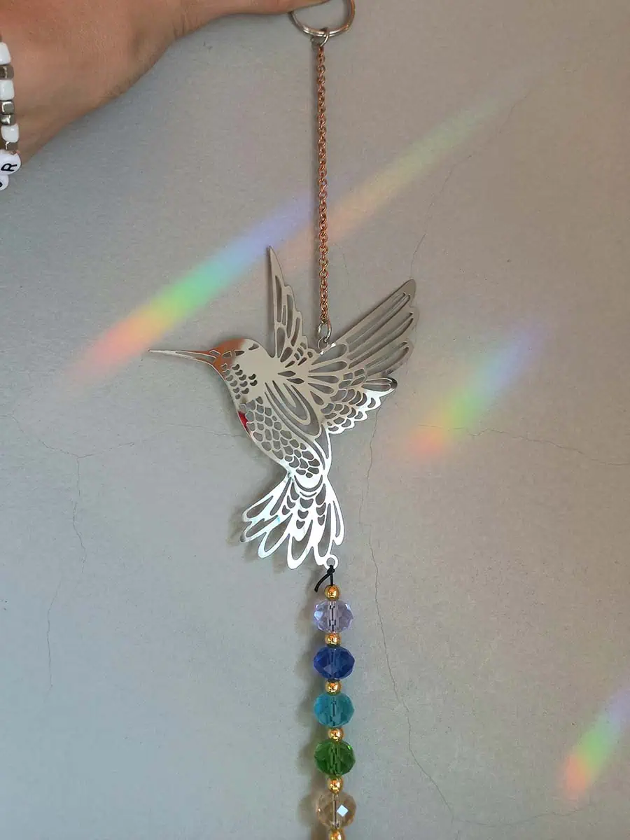 Atrapasol de acero inoxidable con figura de colibrí y cristal para reflejar la luz del sol