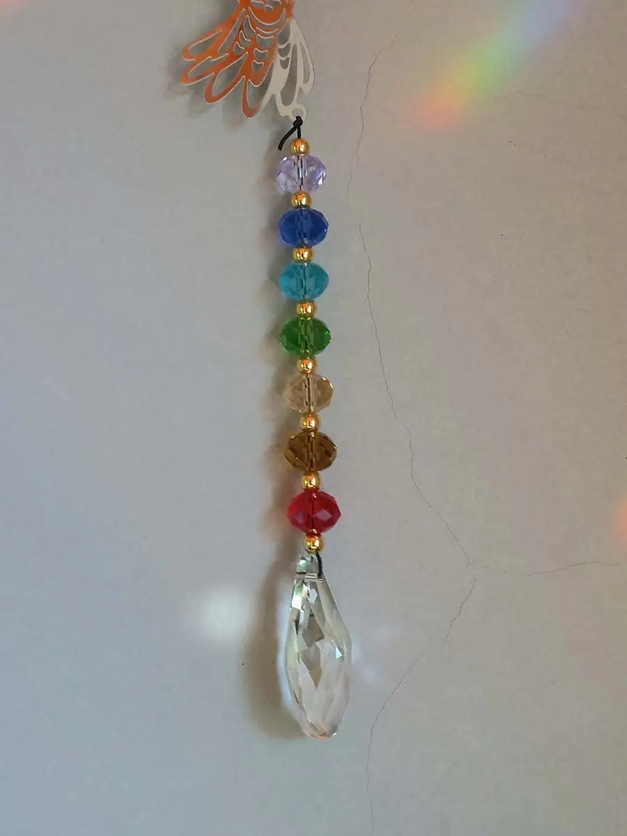 Atrapasol de acero inoxidable con figura de colibrí y cristal para reflejar la luz del sol