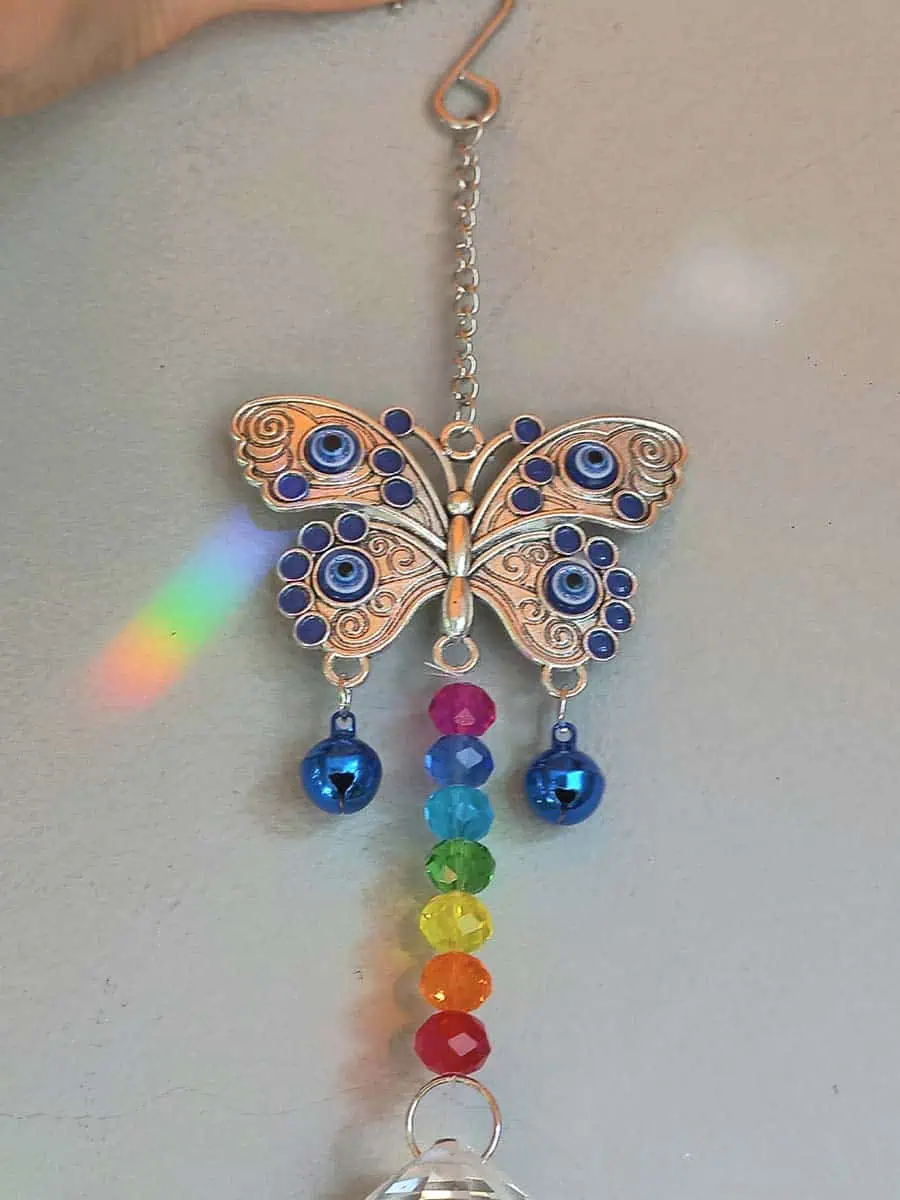 Atrapasol mariposa con ojo turco y cristal decorativo para ventana