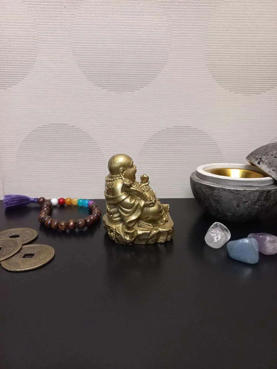 imagen de un Budai de la abundancia con lingote