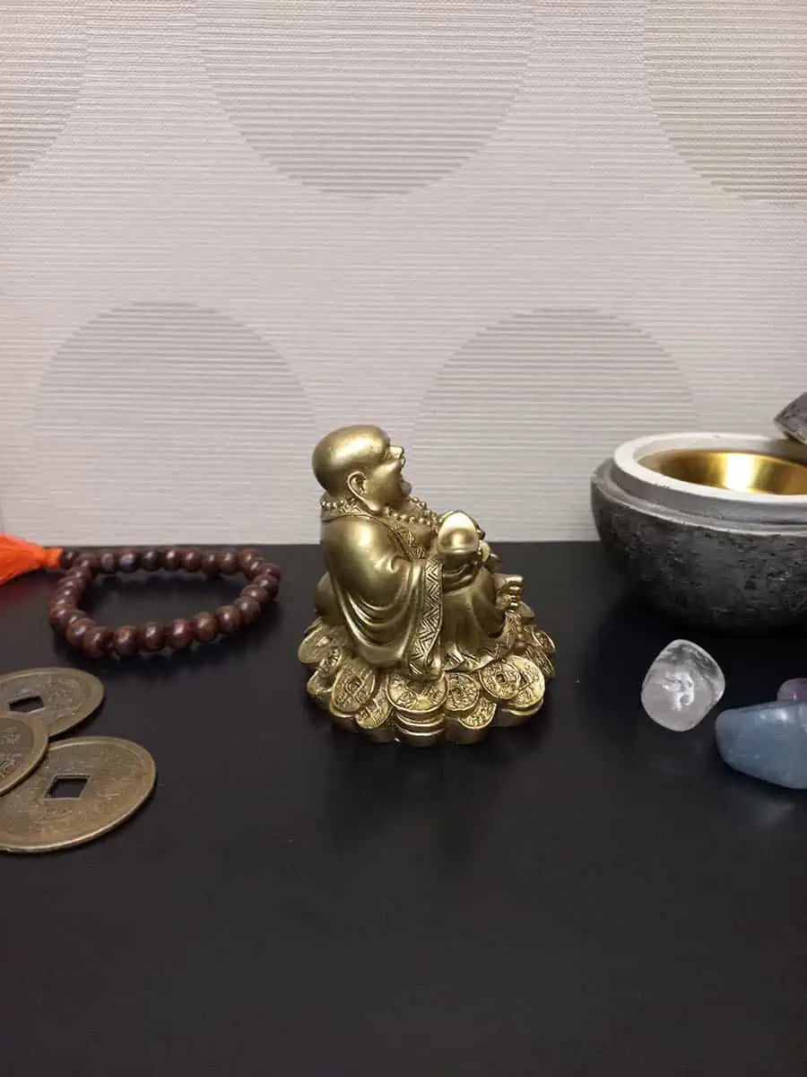 imagen de un Budai de la abundancia con lingote