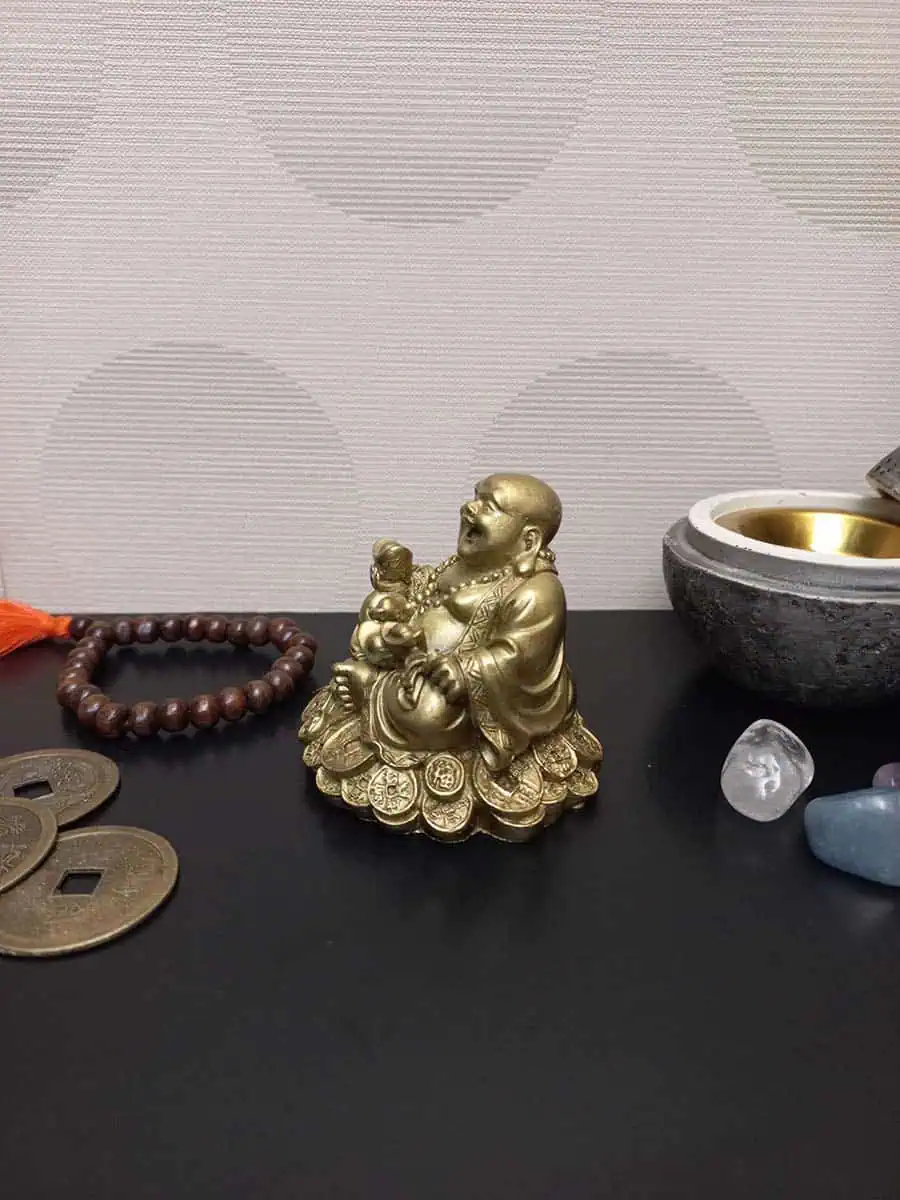 imagen de un Budai de la abundancia con lingote