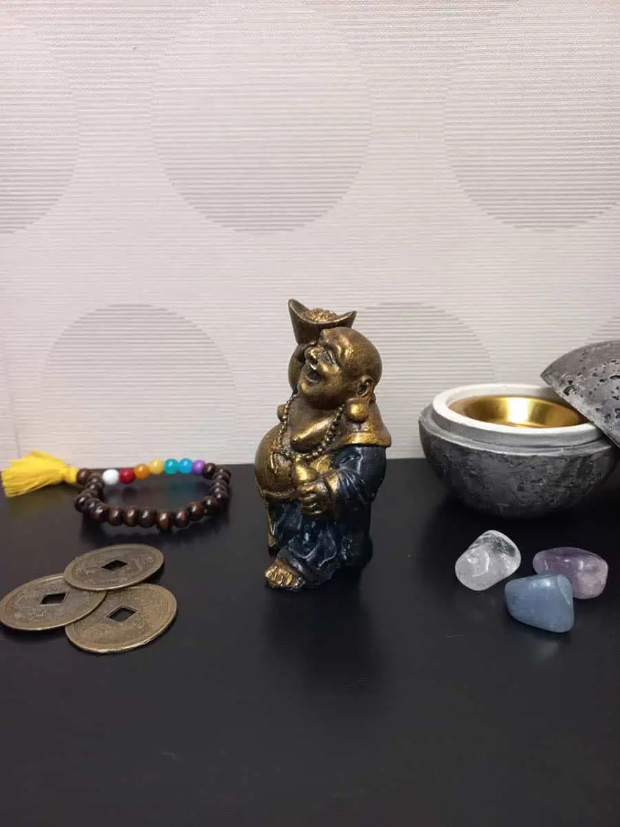 imagen de un Budai de la abundancia con lingote